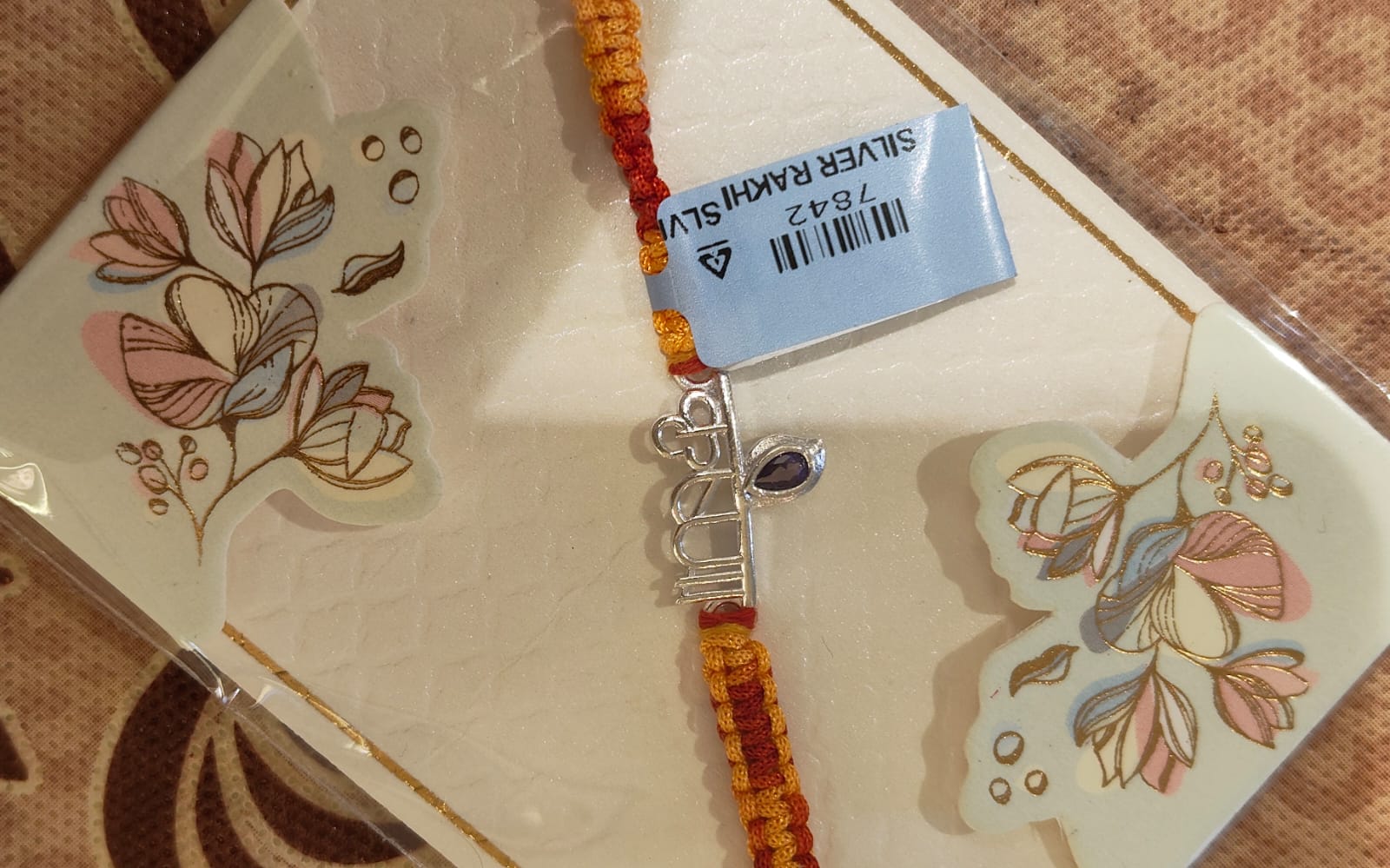 SILVER RAKHI
